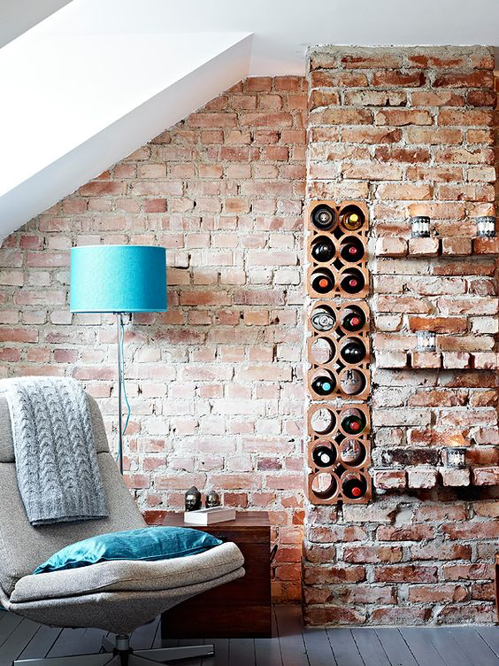 wine racks on exposed brick wall