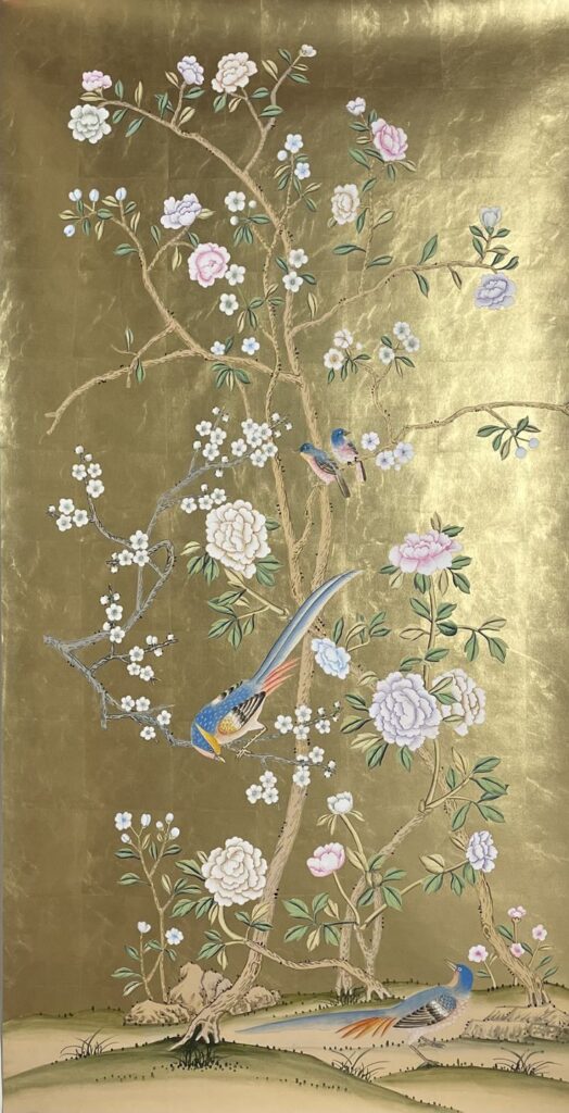 Floral wallpaper next to a hand-painted mural