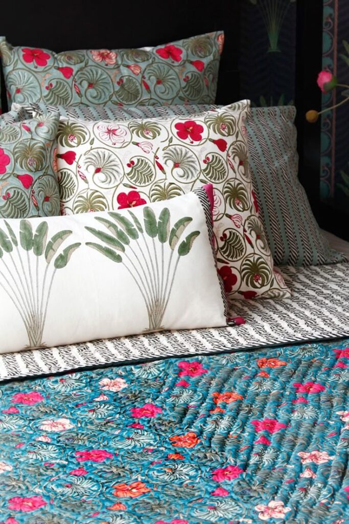 Kalamkari cushions, silk bed runners, Banjara throws, cane blinds, velvet headboards