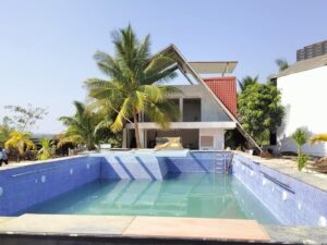 site undergoing construction of villa with swimming pool